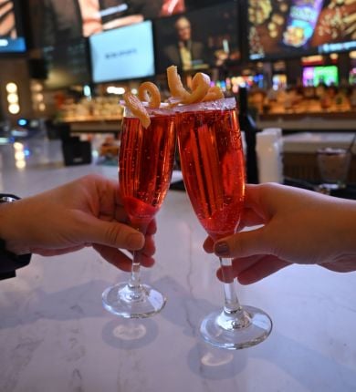image of two red cocktails at sports & social louisiana