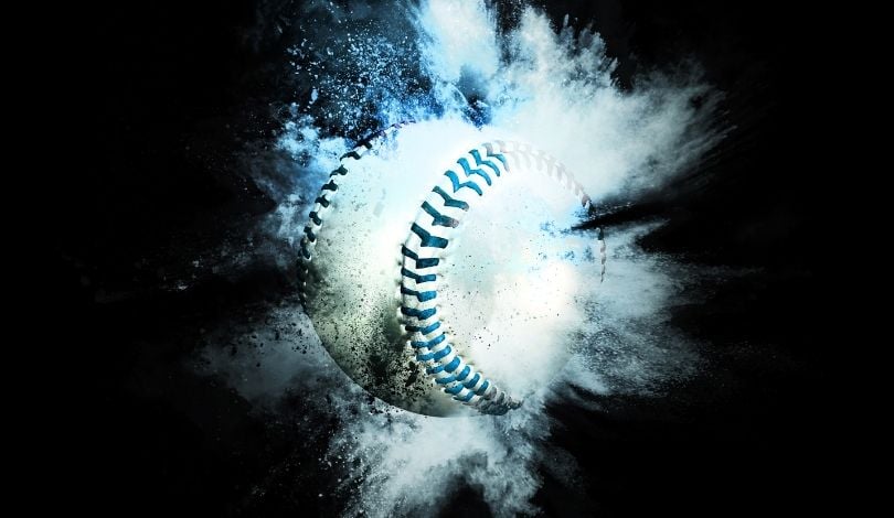 image of a baseball with white and blue smoke around it