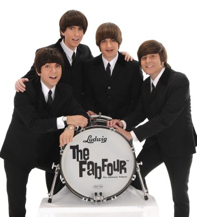 Cover band the Fab Four playing instruments