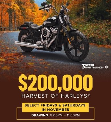 $200,000 Harvest of Harleys. 2025 Harley-Davidson Street Bob Motorcycle on a road with fall foliage in the background.