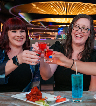three women toasting exes