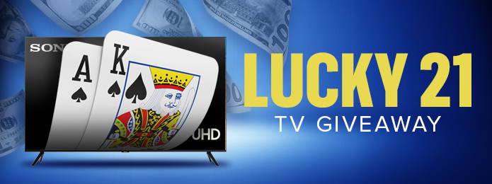 blue background with yellow text saying lucky 21 tv giveaway and featuring playing cards and a flat screen tv