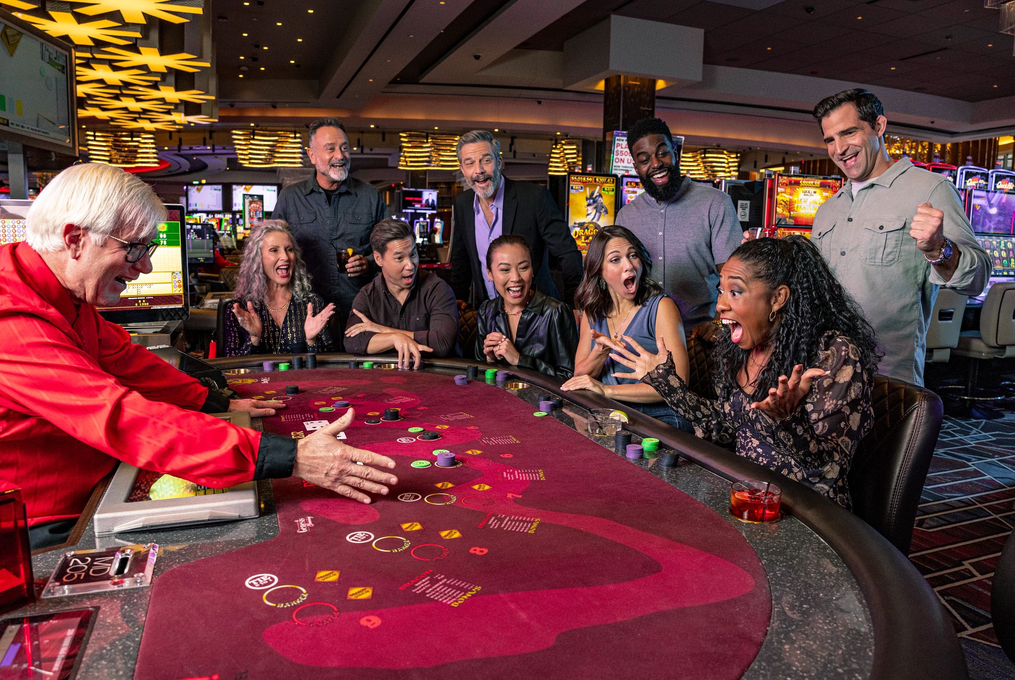 Guests playing baccarat at Live! Casino.