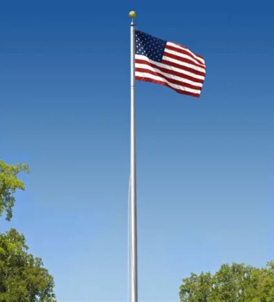 flagpole against a blue sky