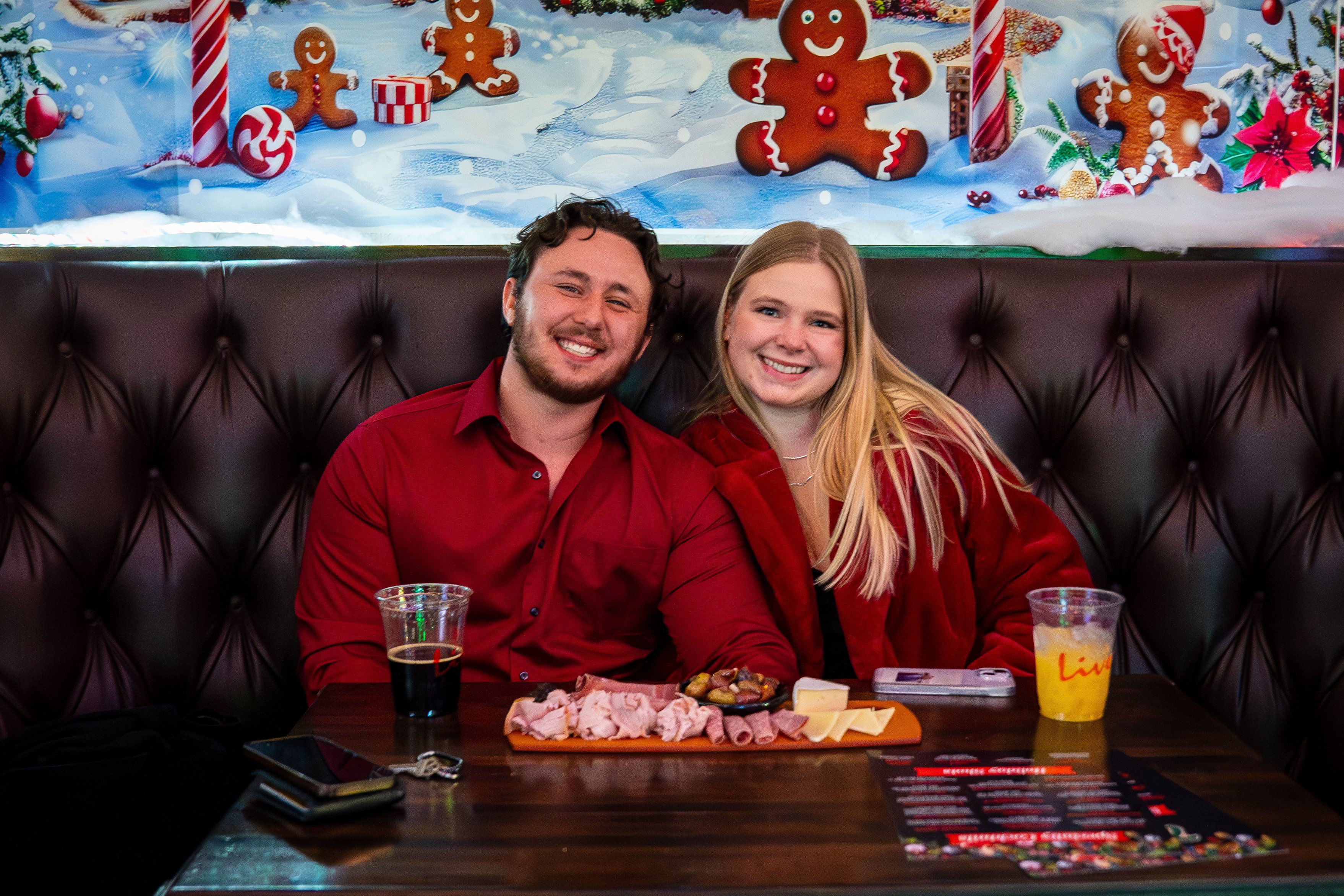 A couple sitting at Tinsel Tavern.