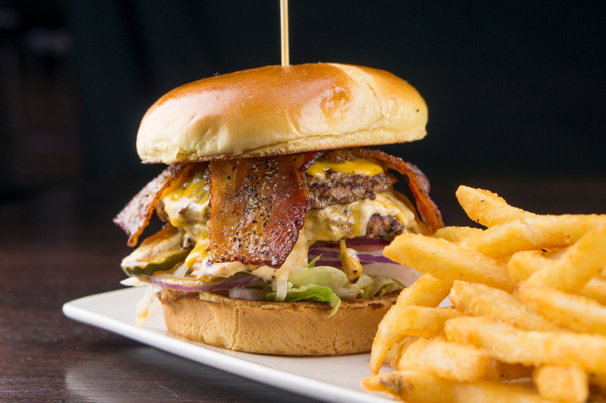 $10 burger and friend at sports and social orlando