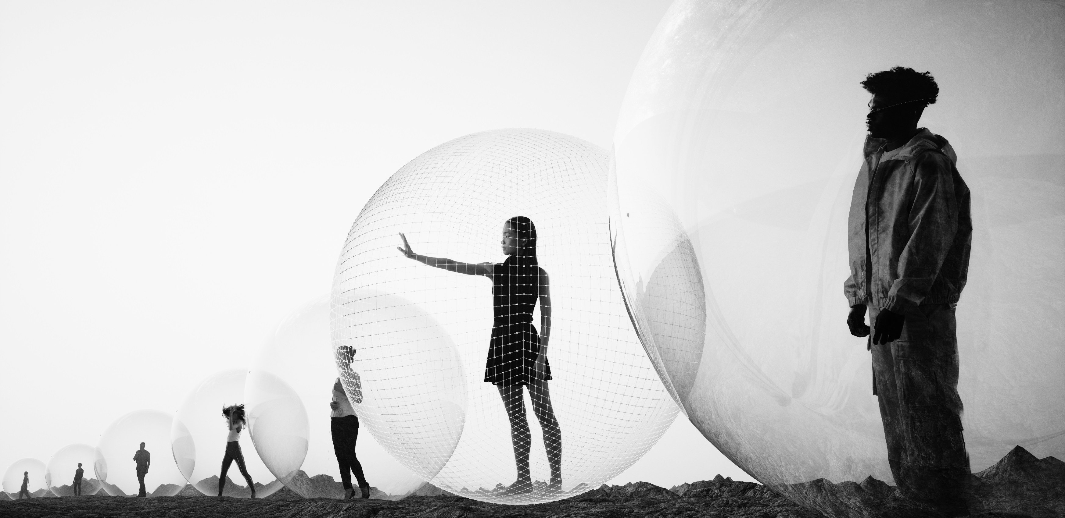 Image of people standing inside zorb balls