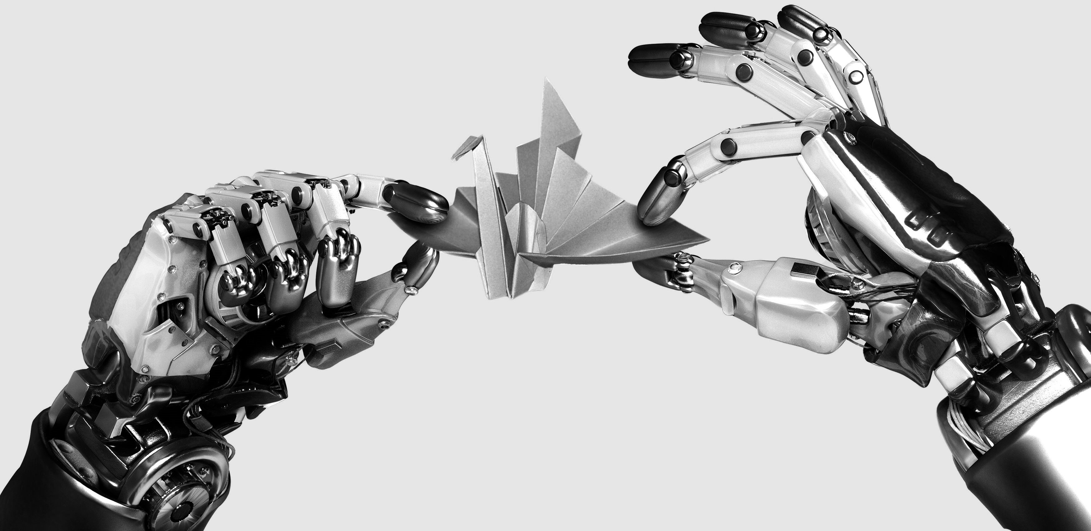 Robot hands making origami