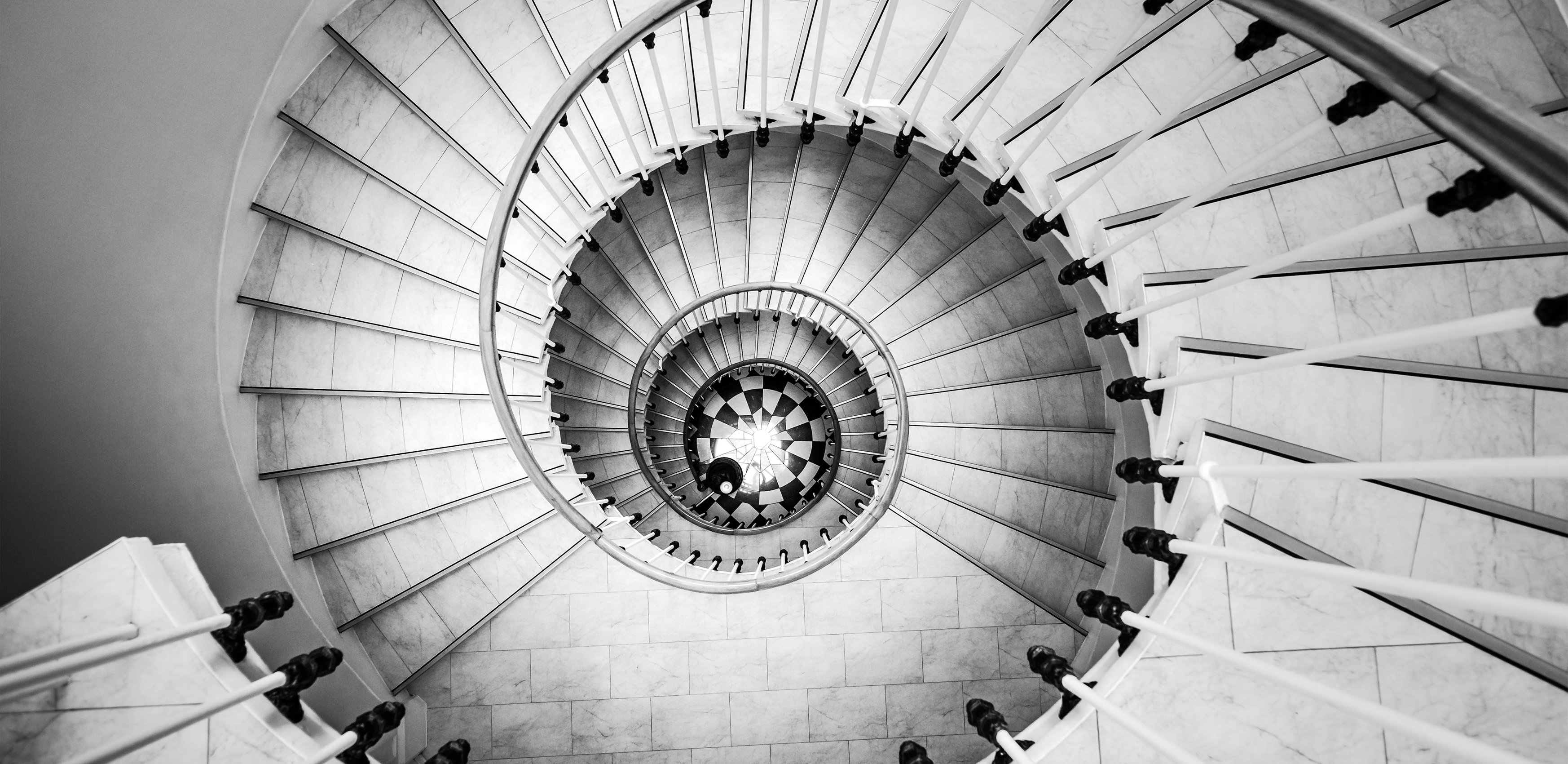 Birds eye view of a tall spiral staircase