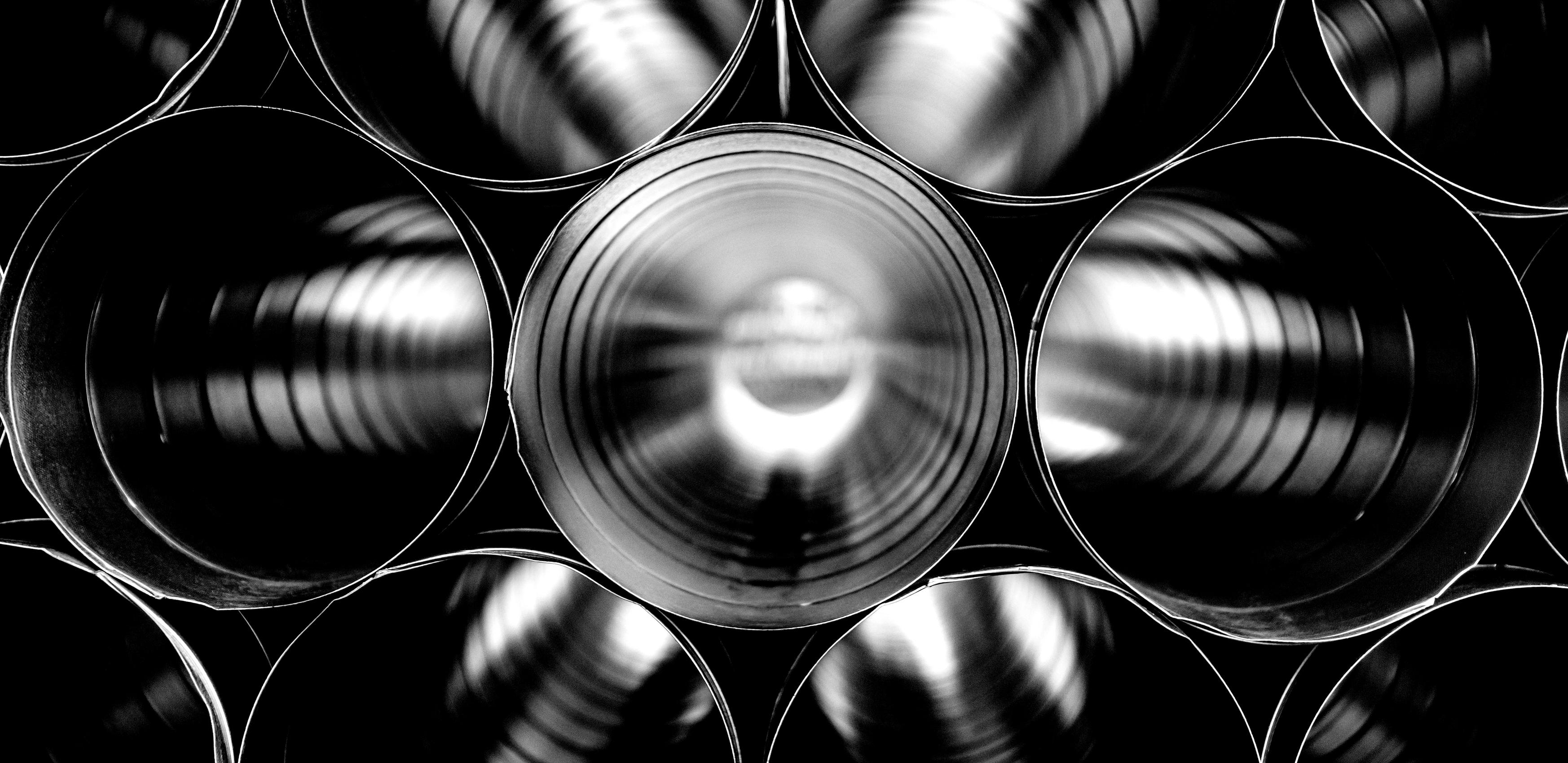 Multiple metal tubes stacked on top of each other
