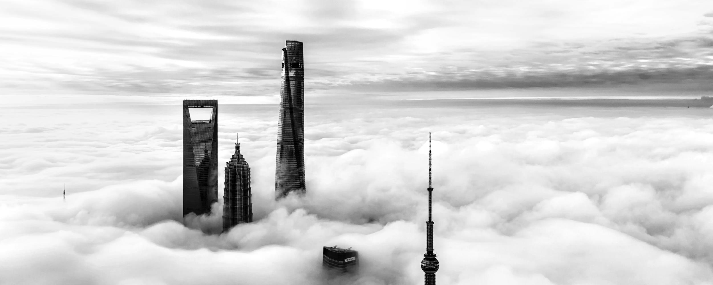 Skyscrapers appearing through the cloud