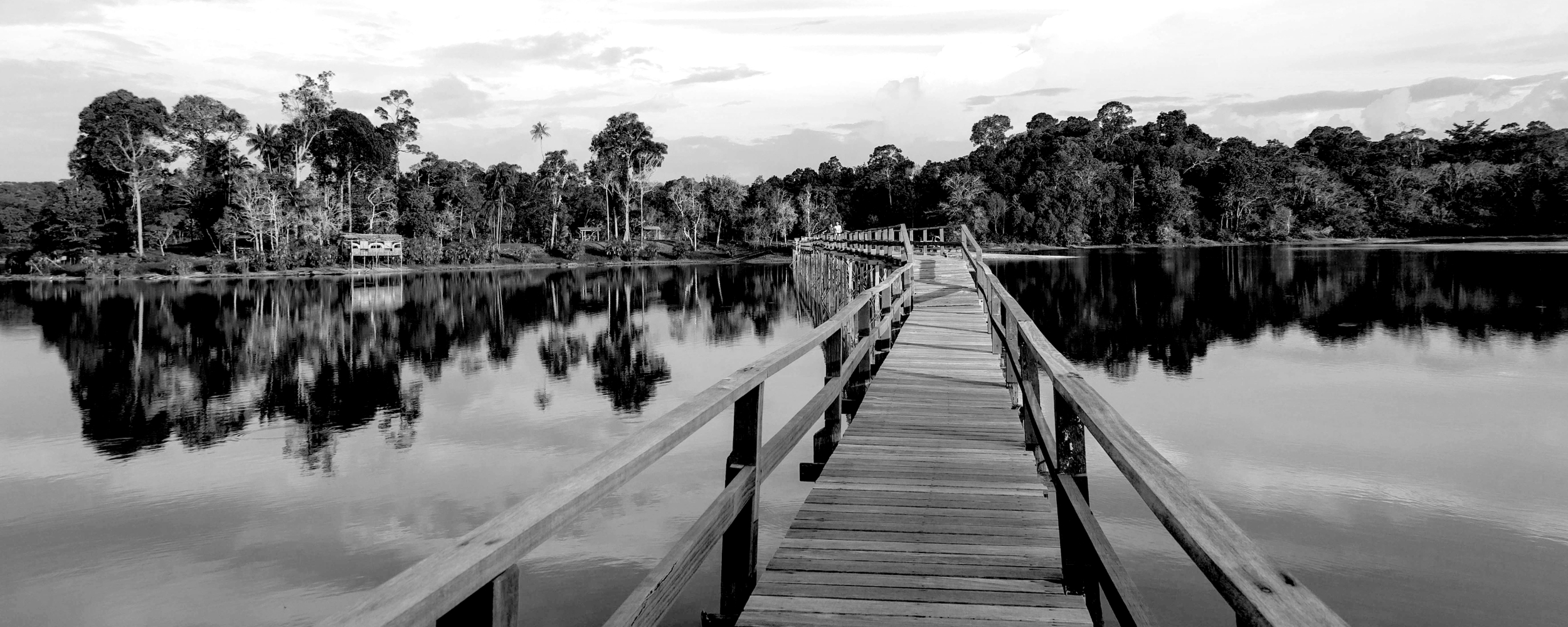 A pier extending over a large body of water