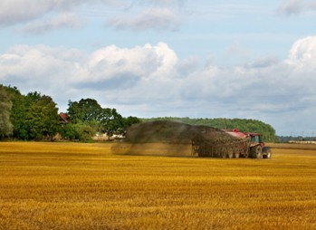 tractor spraying biosolids