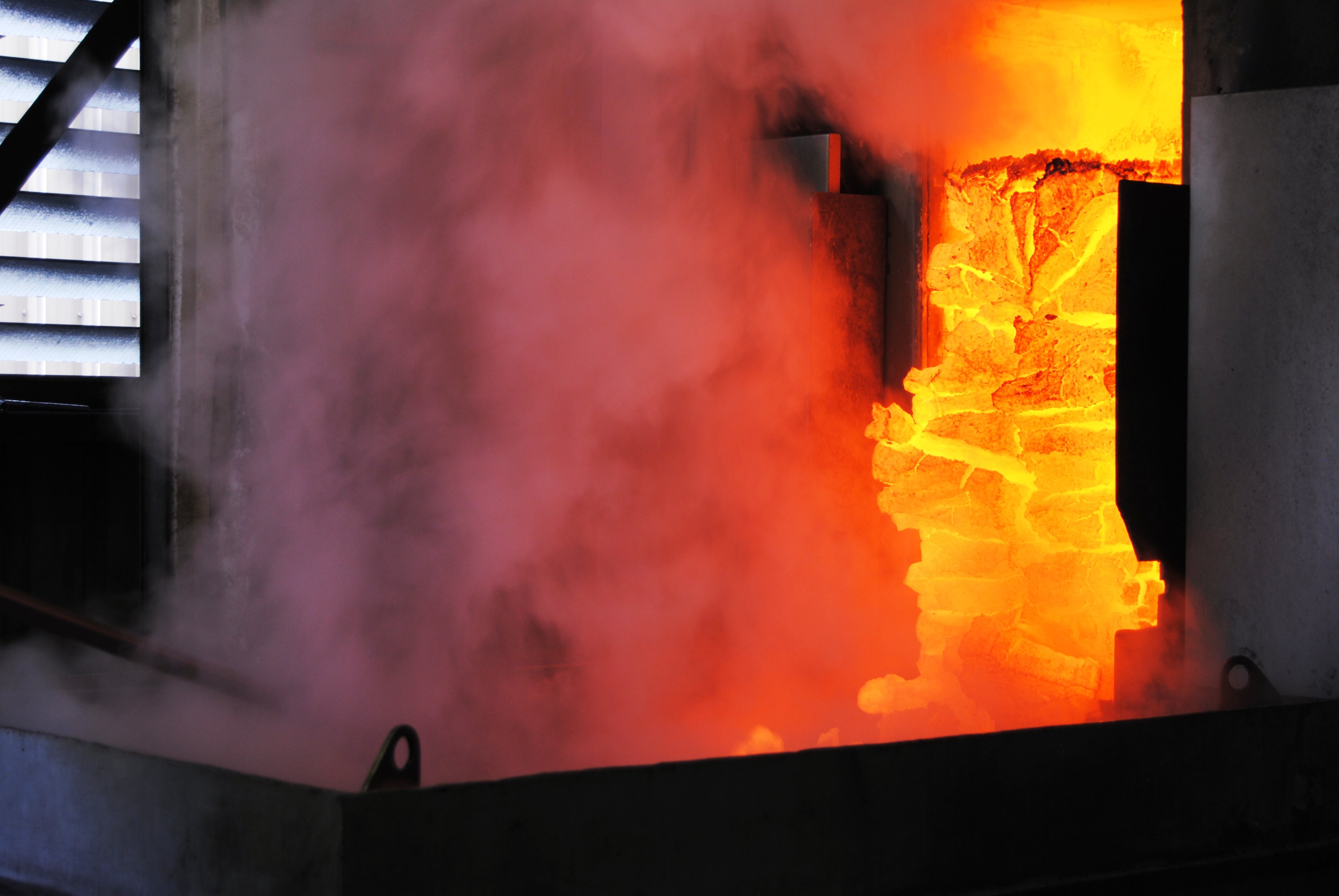 Descarregar o coque do forno