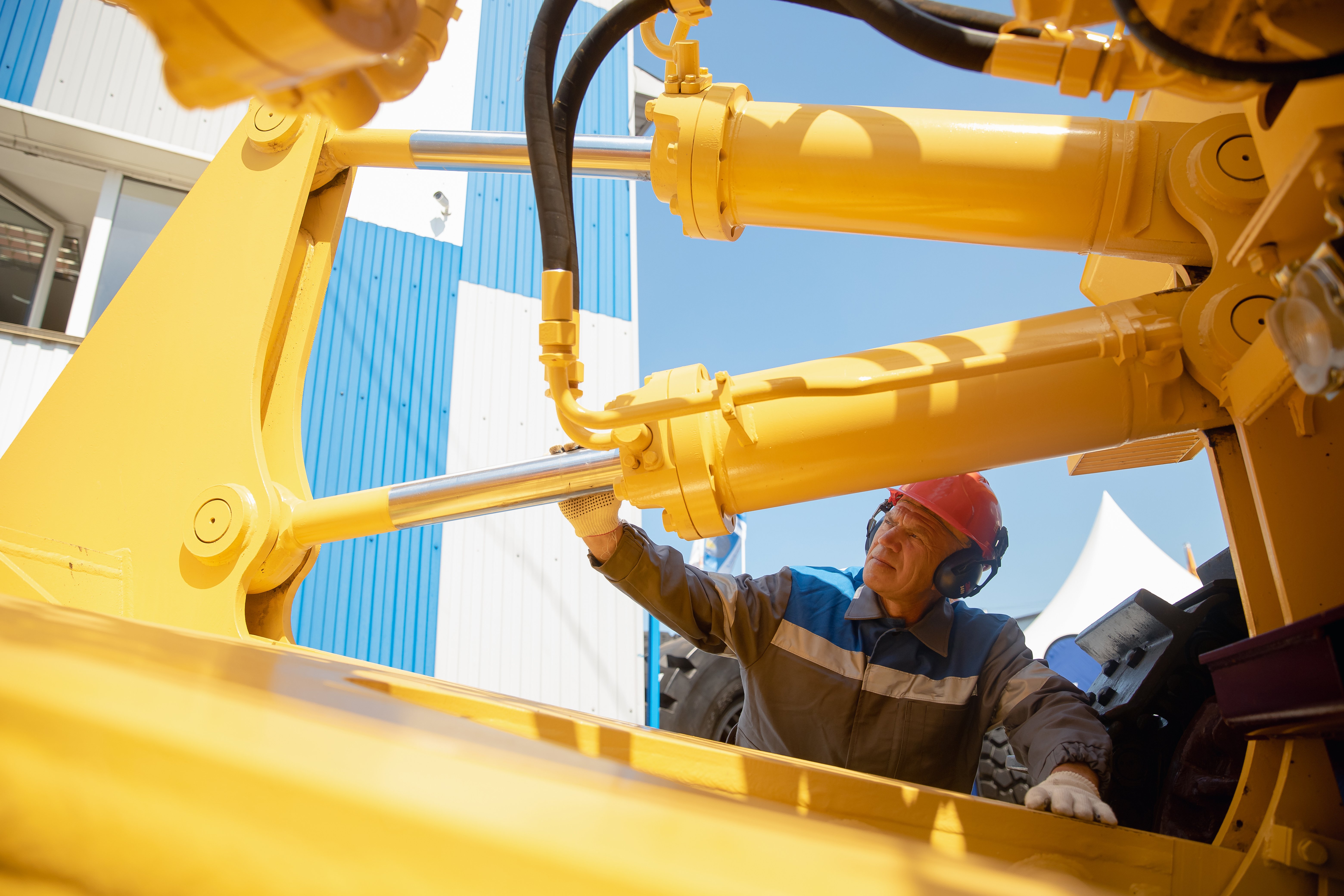 checking equipment on excavator