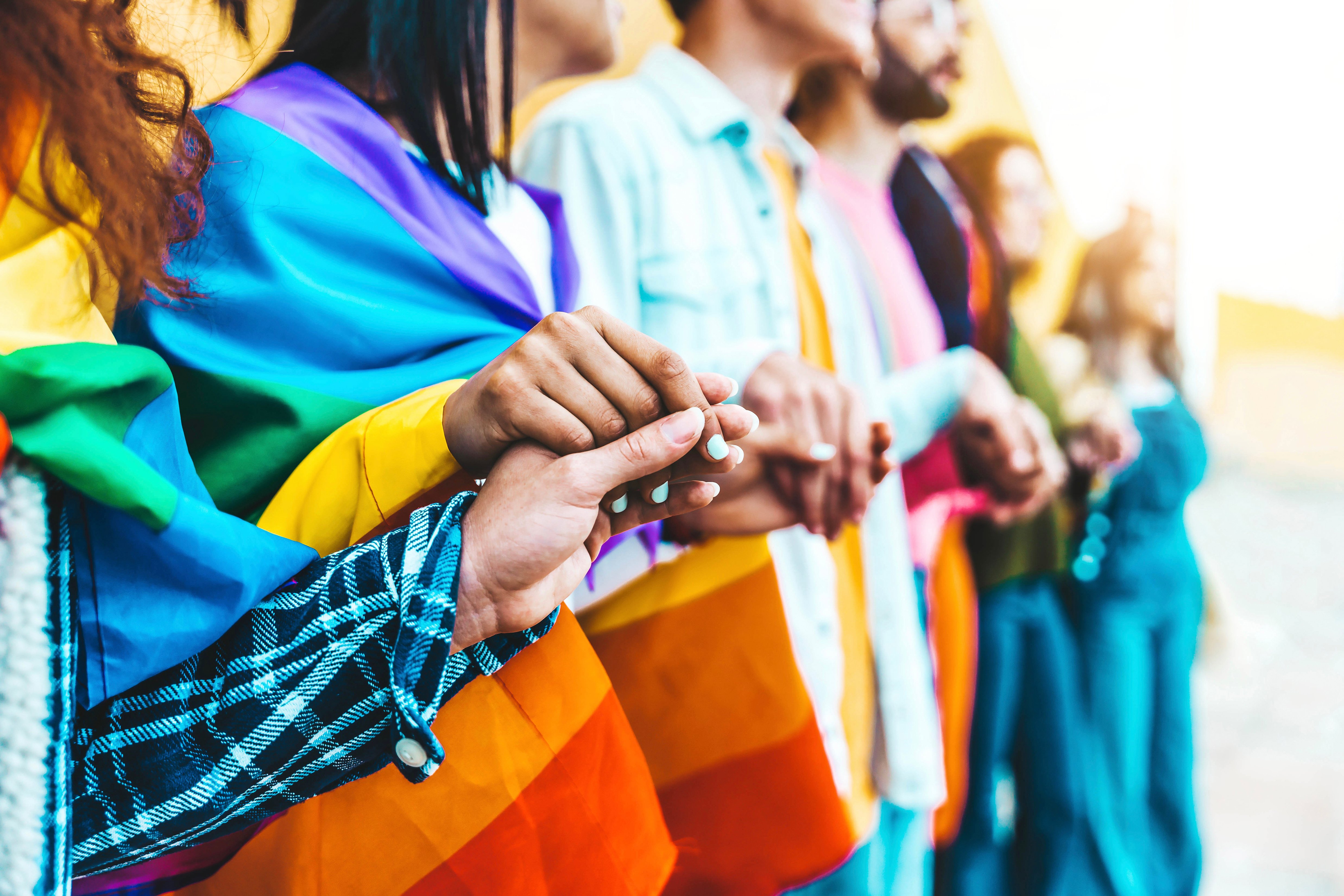 Group of LGBTQ+ holding hands