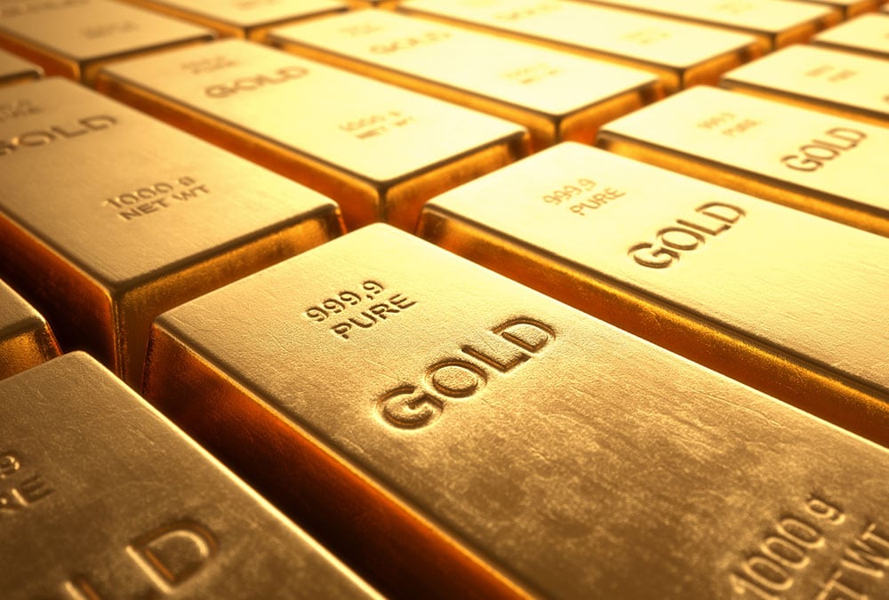 Stacked gold bars display the words "GOLD" and "999.9 PURE".