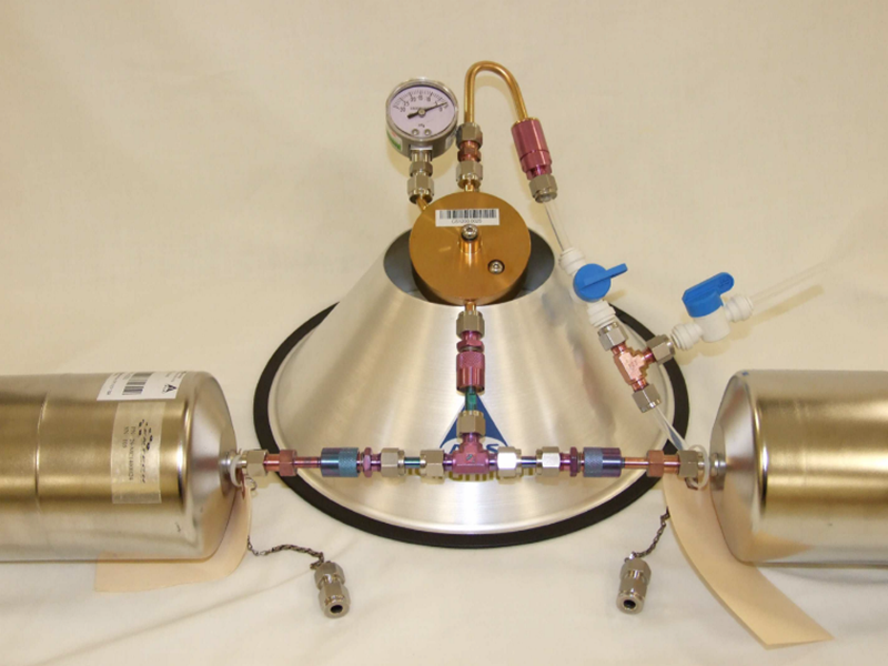 Duplicate Canister Sampling Apparatus.