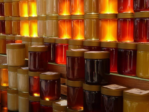 jars of honey stacked up