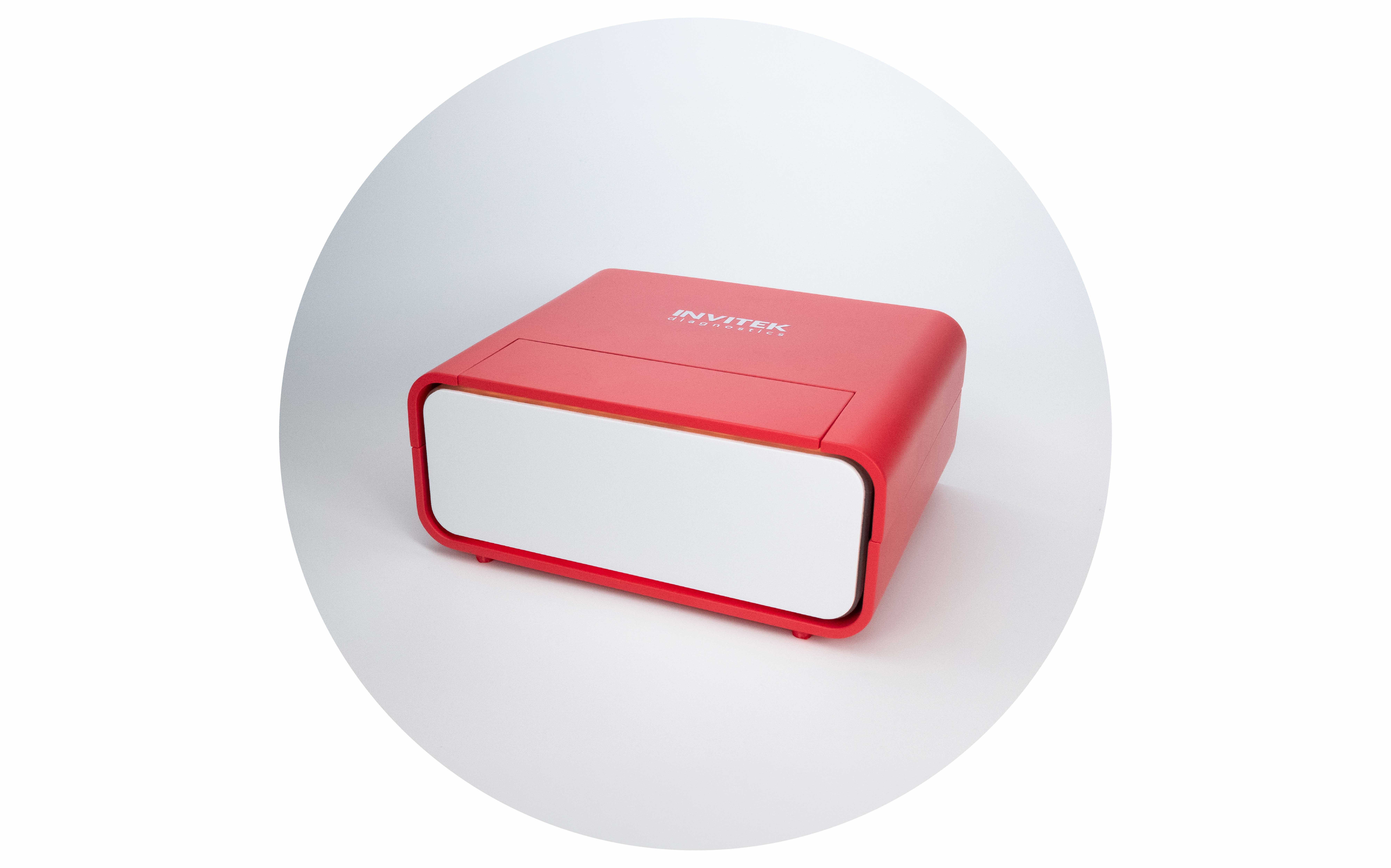 Red InviTek diagnostic device with a compact rectangular design and white front panel, photographed at an angle against a light gray background.