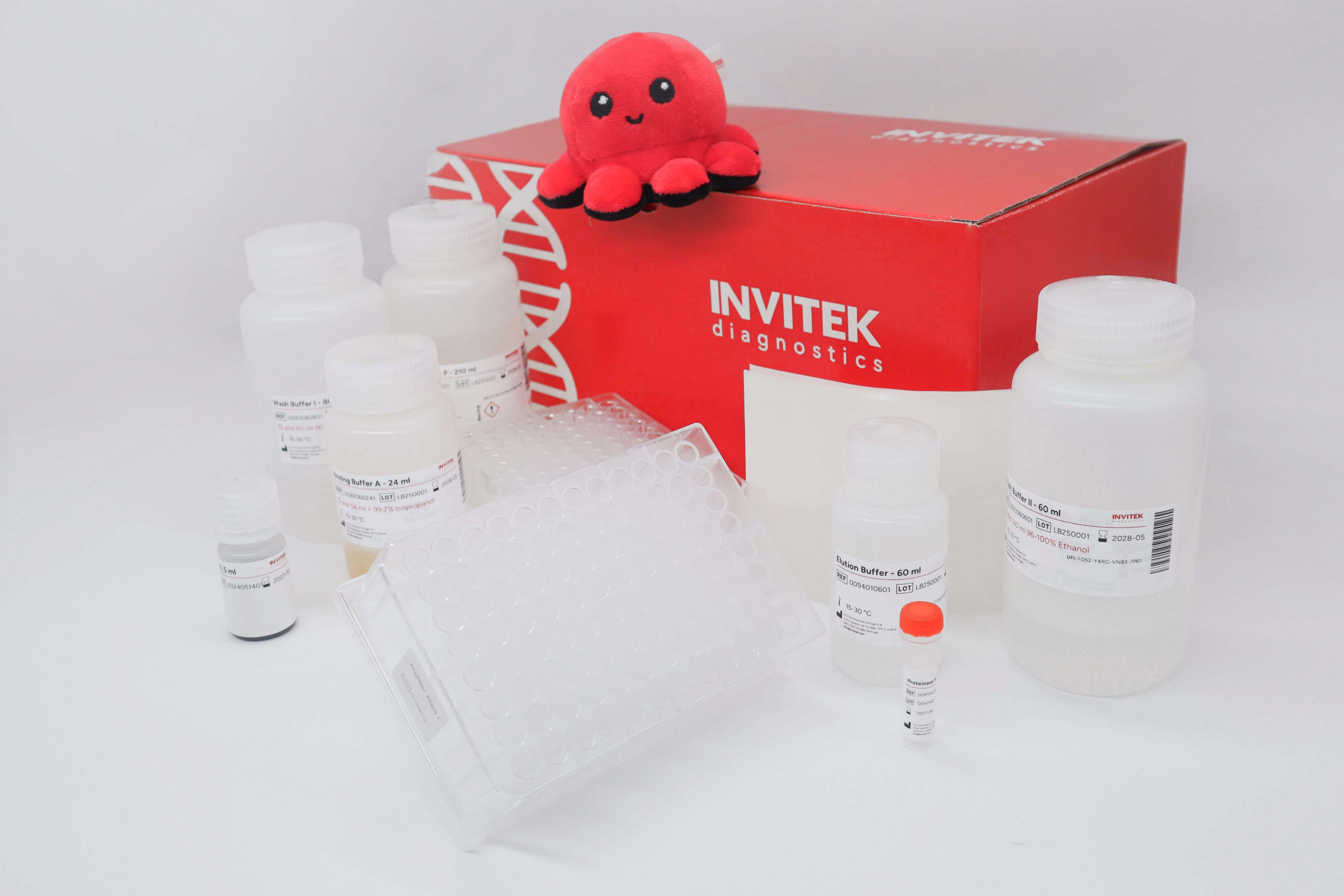 Red Invitek Diagnostics InviMag Plant DNA Mini Kit box behind reagent bottles, prefilter plate, and plastic ware.