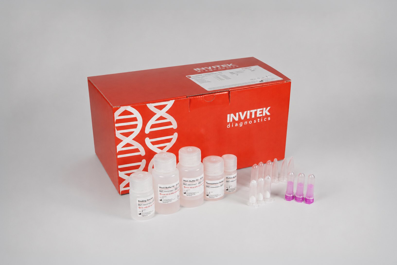 InviSorb® Lyo Pathogen Kit red box with clear tubes and pink pipette tips arranged in front.