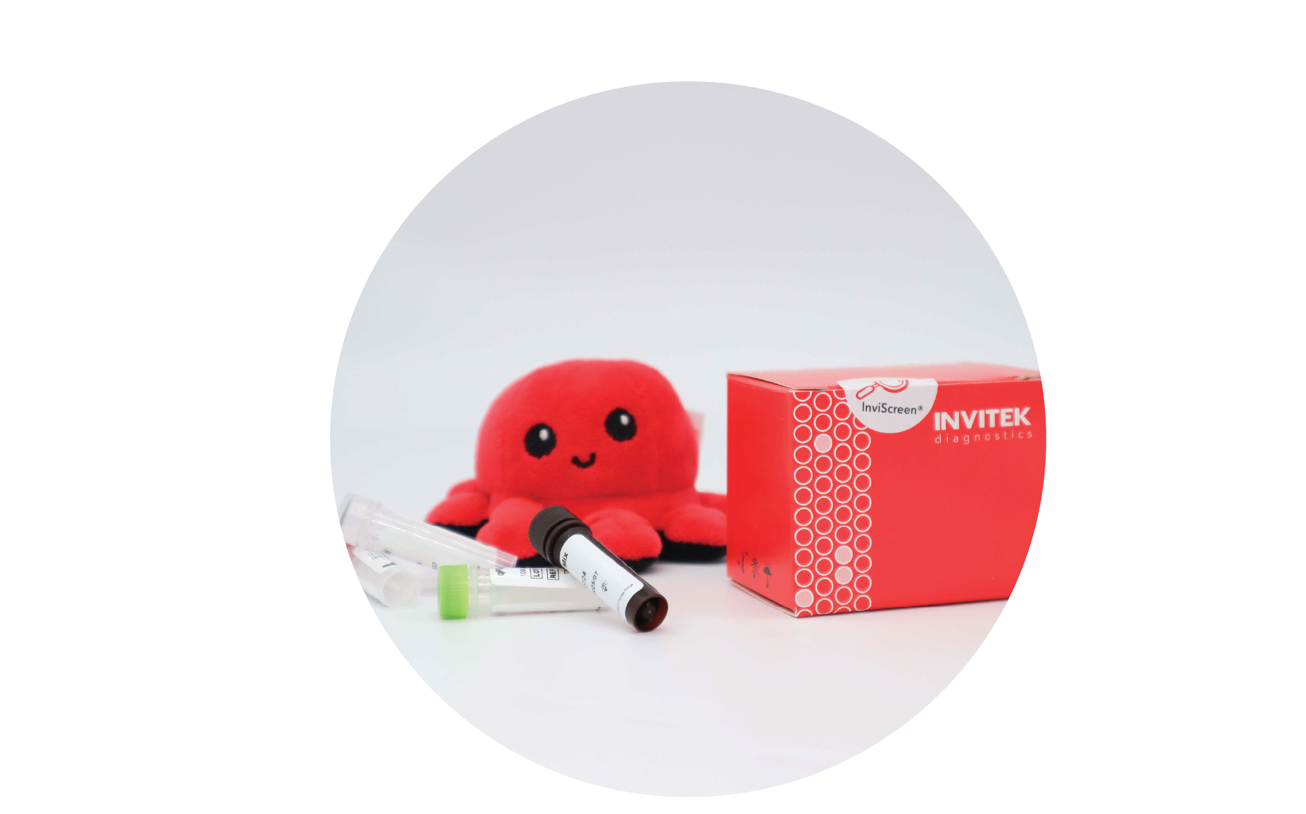 InviScreen Mycoplasma kit: plush red octopus “Invi” sits on a red INVITEK box; four reagent vials (red, grey, brown, green caps) stand in front.