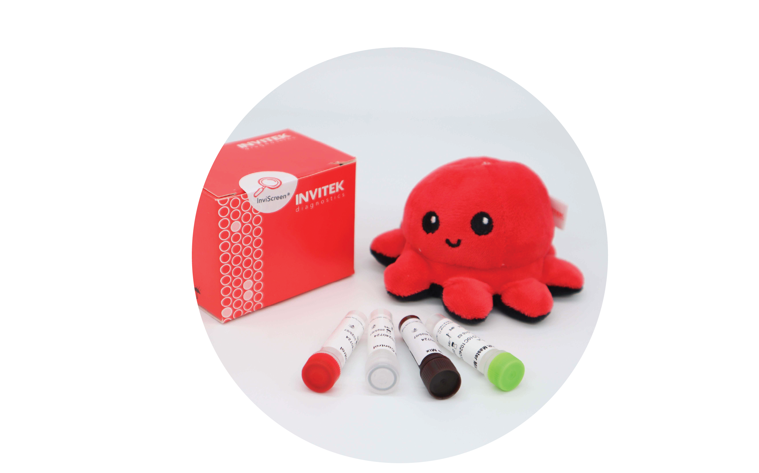 InviScreen O157:H7 kit: red box at left, plush octopus to the right, and five reagent vials (red, grey, brown, green and clear caps) spread in front.