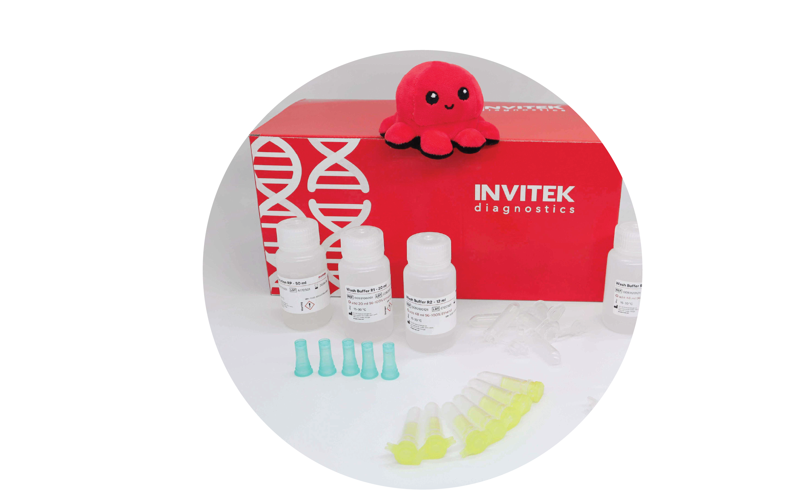 Red Invitek Diagnostics InviTrap Spin Universal RNA Mini Kit box behind reagent bottles, and color-coded reagent vials with yellow spin filters, and tubes laying scattered in front.