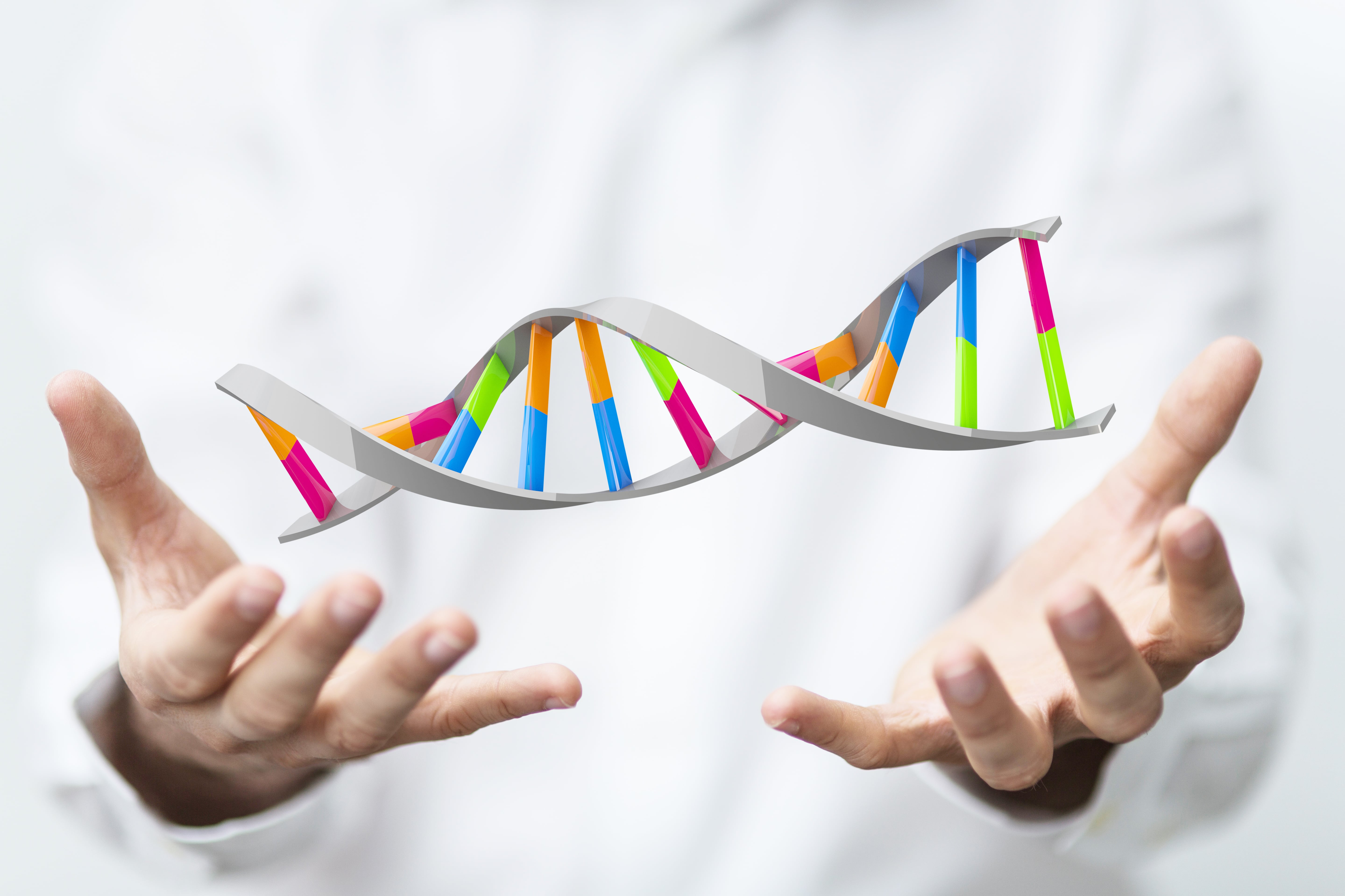 Hands in a white lab coat positioned around a colorful 3D DNA model, symbolizing genetic research and biotechnology.