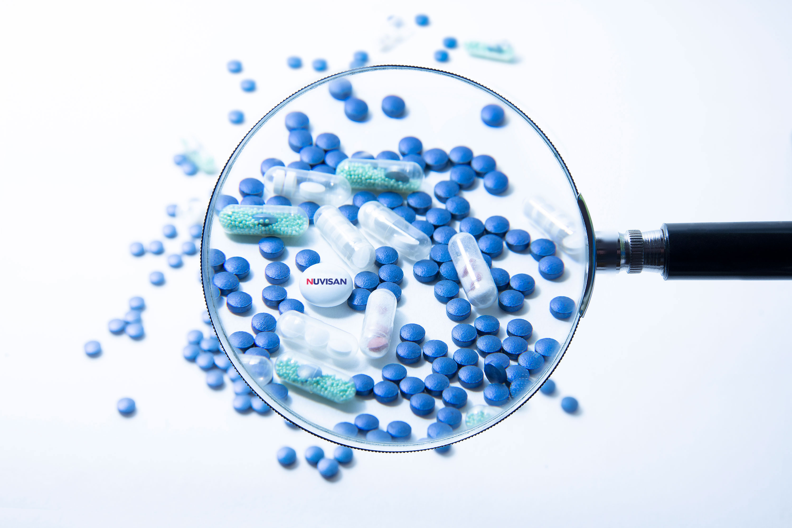 Blue pills with Nuvisan logo