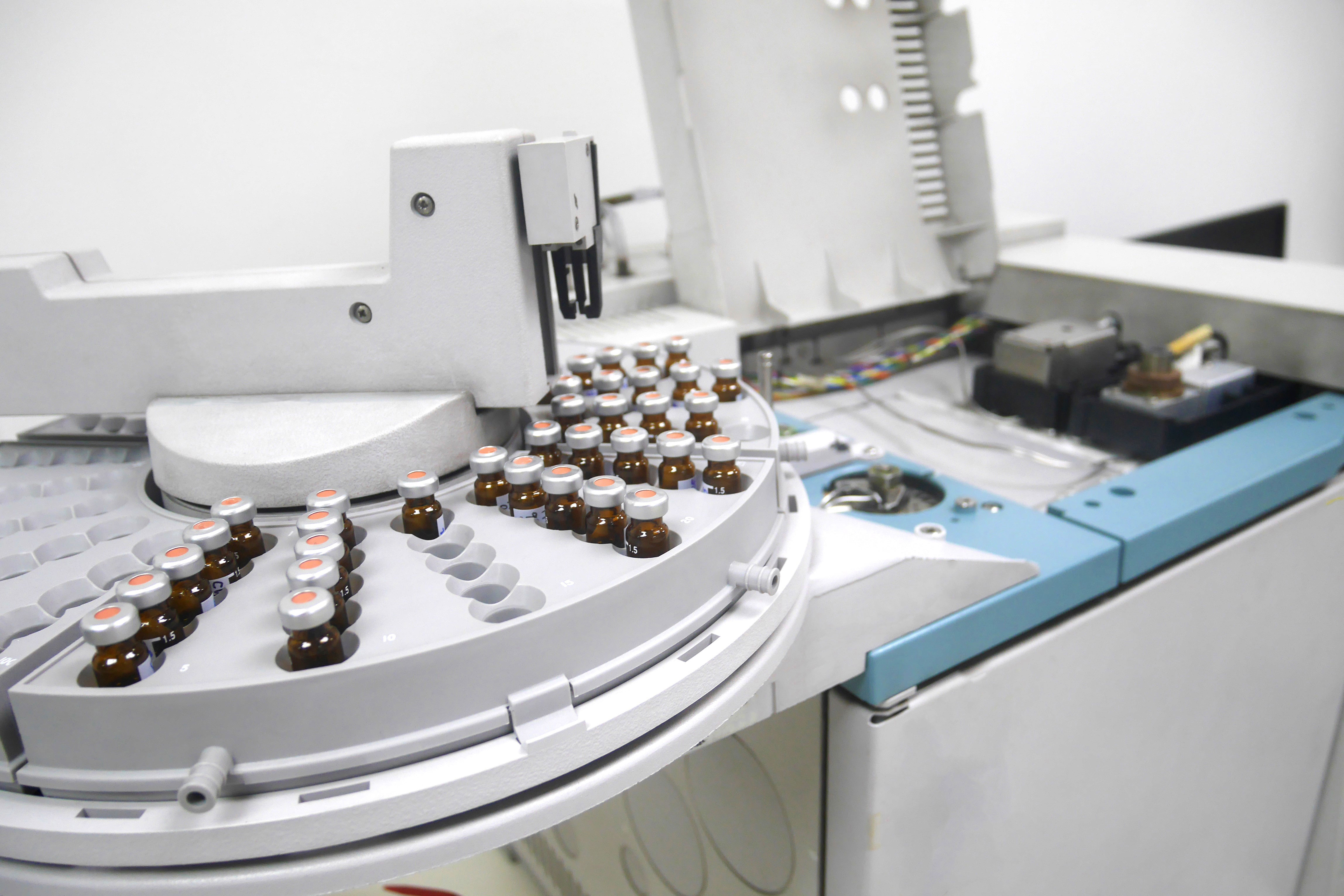 samples in brown glass bottles have been prepared for analysis in a mass spectrometer
