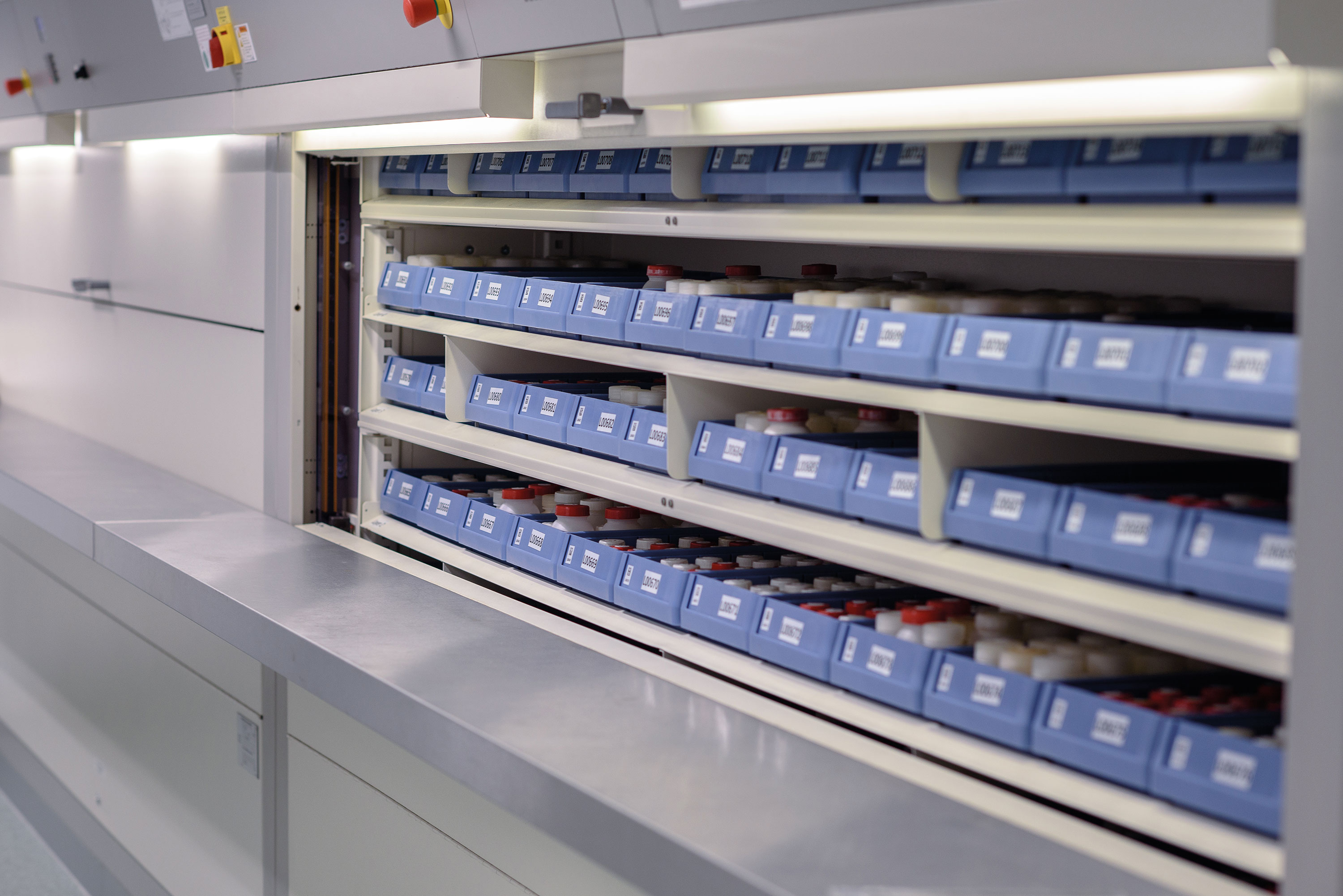 A roller shelf cabinet with chemical building blocks