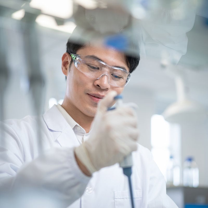 Scientist doing experiment in lab