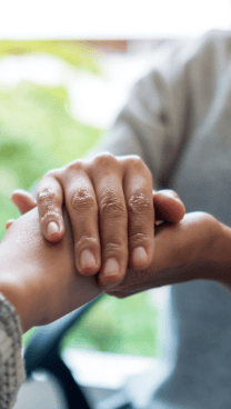An image of two hands holding