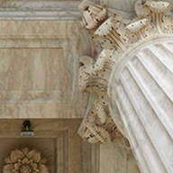 exterior ceiling view of old building with columns