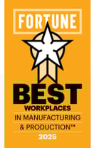 Best Workplace in Manufacturing Award – Fortune in white and Best Workplaces in Manufacturing & Production in Black divided by the award logo in white & yellow outlined in black.