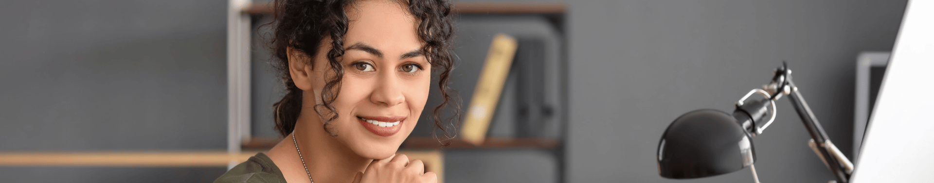 Woman veteran sitting at desk