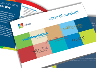 Code of Conduct book showing an open copy below a close book showing the cover.