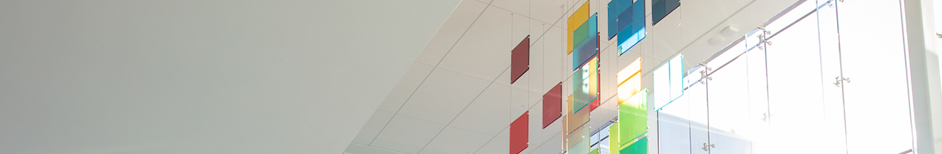 a close-up of a stylized version of the Altria logo mosaic that hangs from a lobby ceiling
