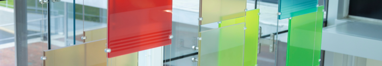 a close-up of a stylized version of the Altria logo mosaic that hangs from a lobby ceiling