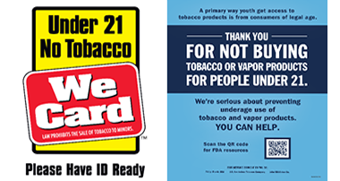 Under 21 No Tobacco We card sign in yellow, red, black and white to the left of a “Thank you for not buying tobacco or vapor products” for people under-21 poster in two shades of blue