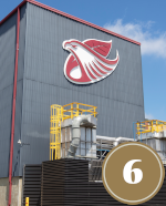 front of U.S. Smokeless Tobacco Company building with eagle logo