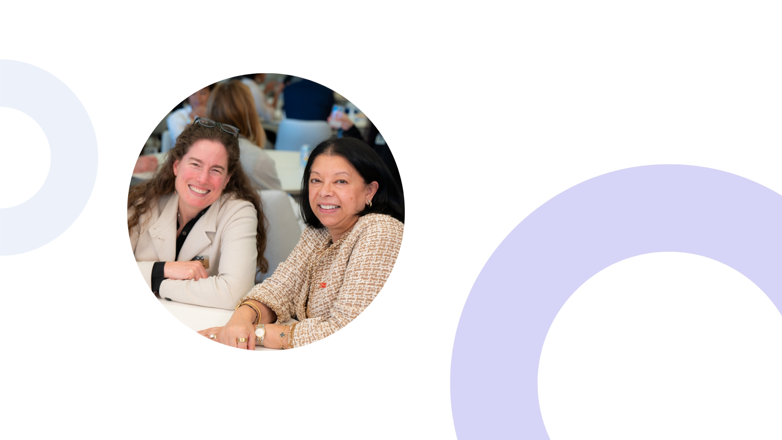 Two women physicians smiling together