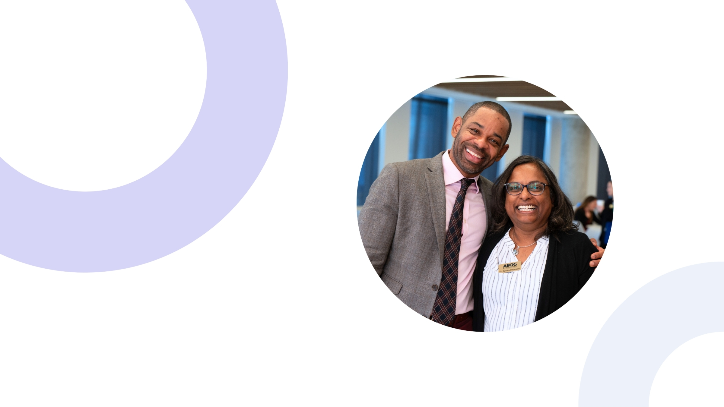 Two women physicians smiling together