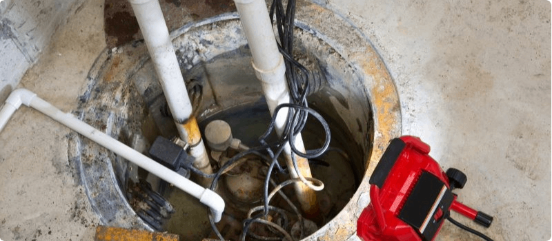 Sump pump being serviced
