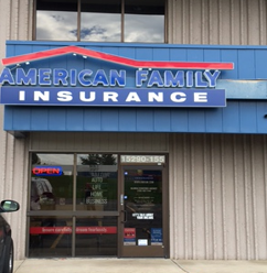 a store front with a blue sign