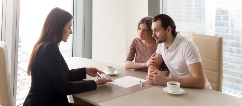 Couple meeting with realtor