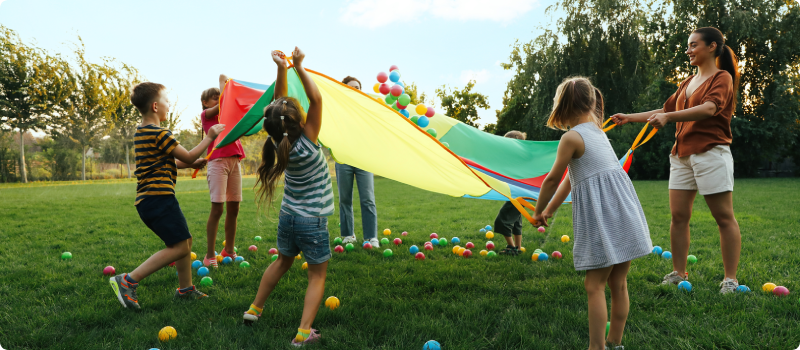 a group of children playing in a park