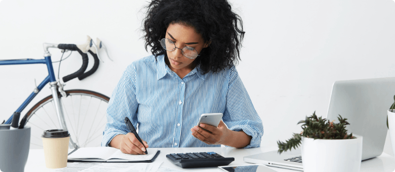 Person working at her desk.